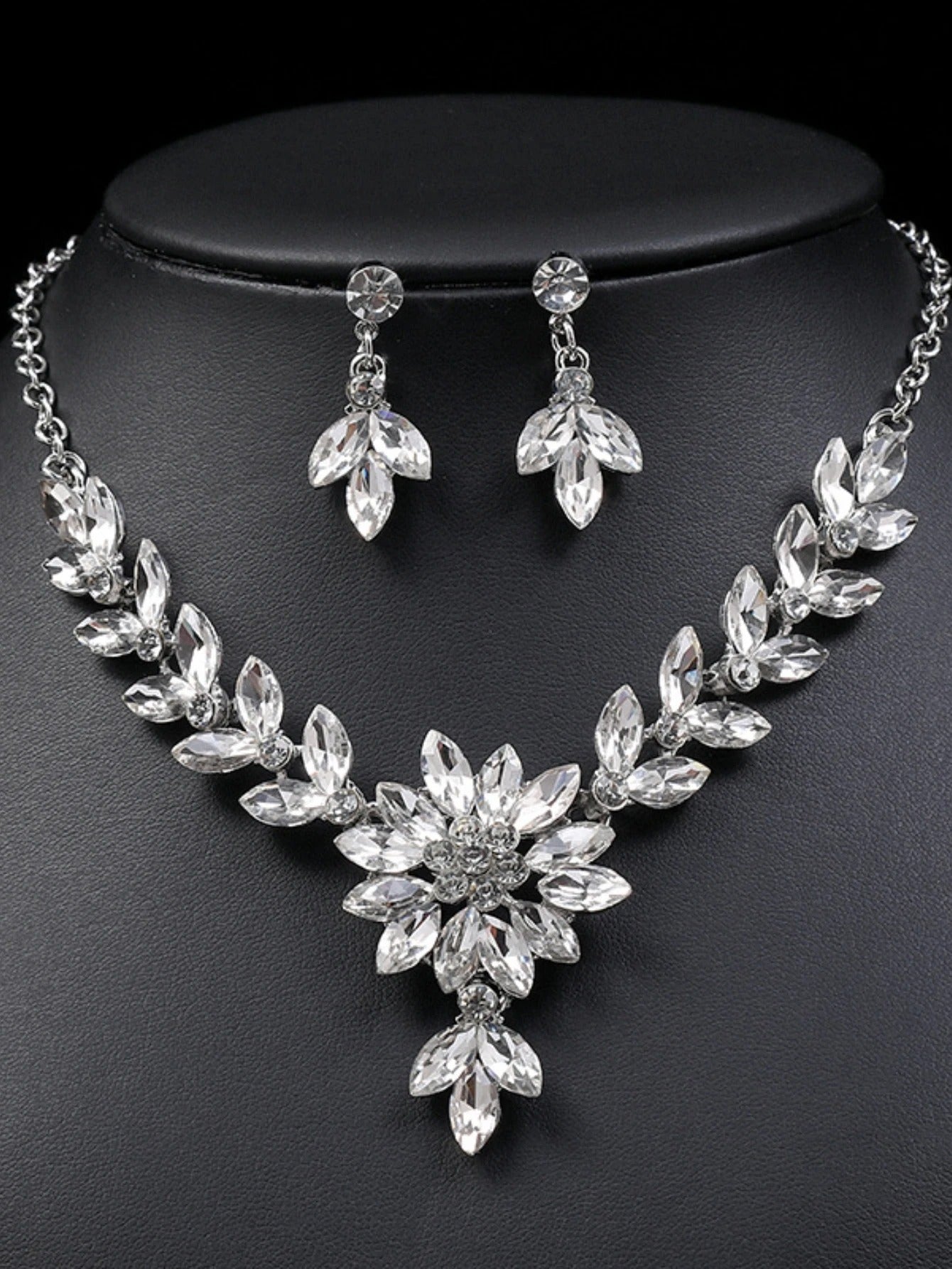 lower necklace earrings and evening dress accessories.