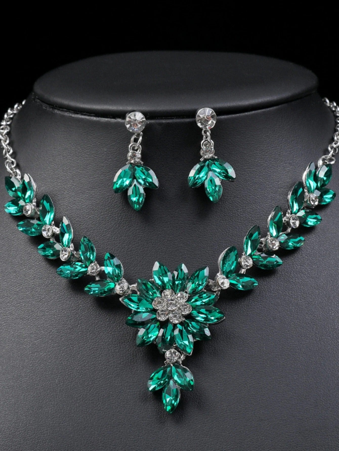 lower necklace earrings and evening dress accessories.