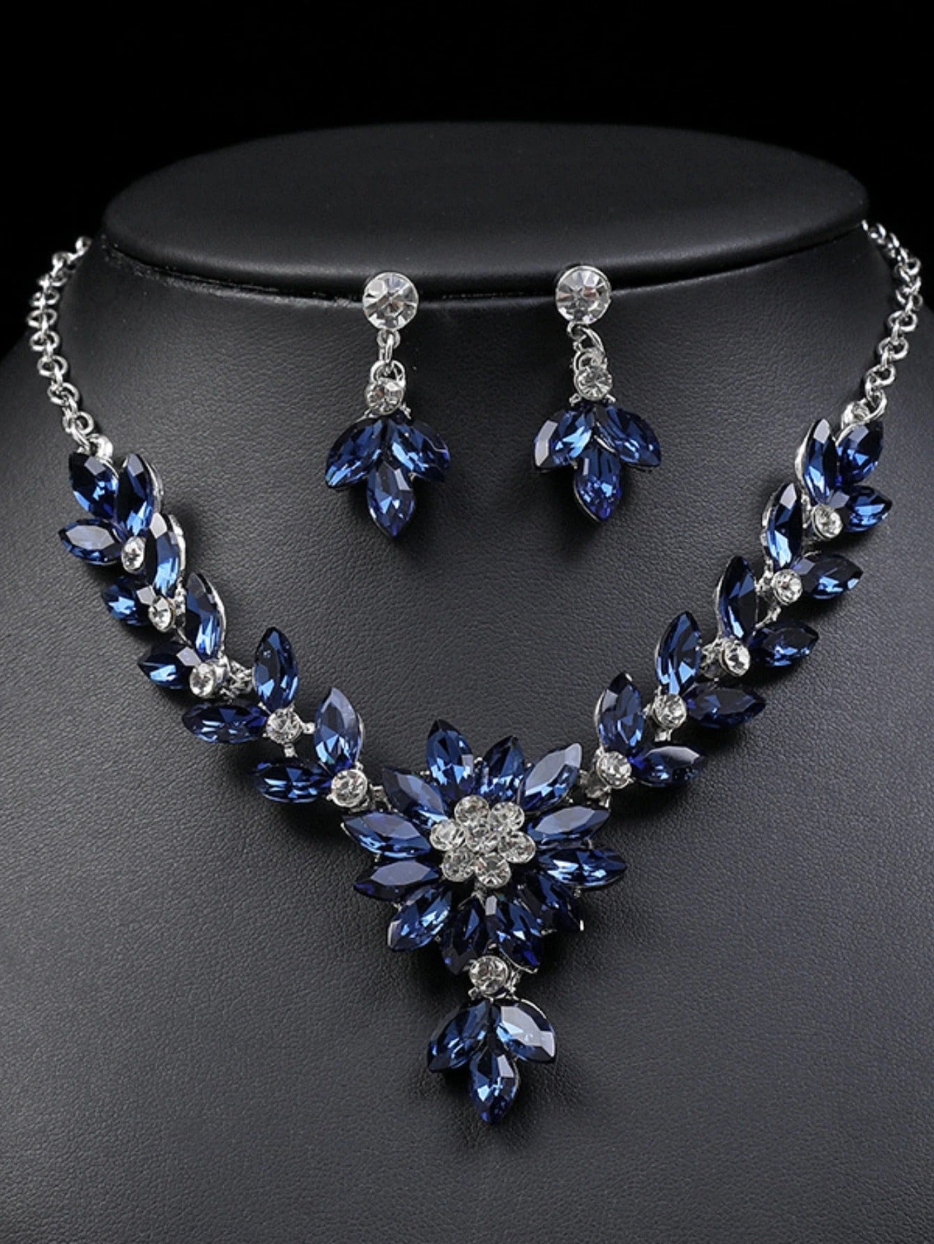lower necklace earrings and evening dress accessories.